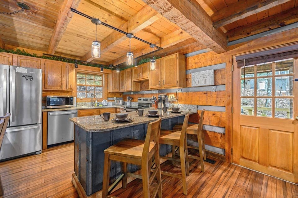 Beautiful custom kitchen, tin paneling. The concept is open to entertain!