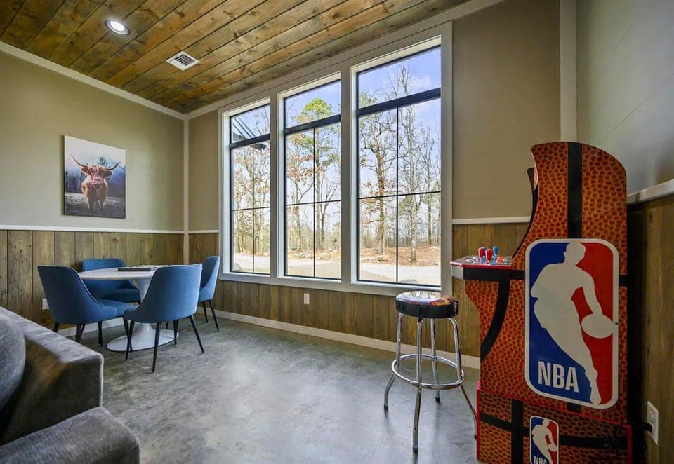 Challenge your friends to a game or enjoy a casual meal in this fun and inviting corner.