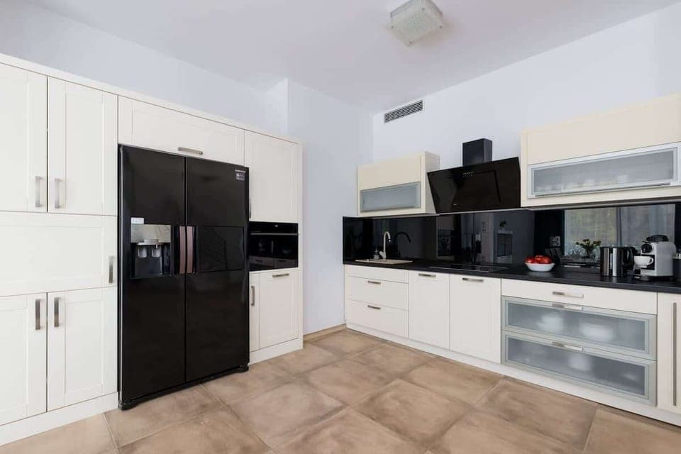 Kitchenette with a kettle.