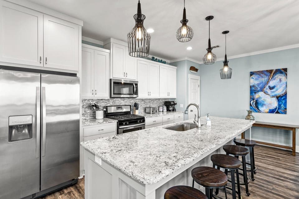 Large kitchen to accommodate multiple cooks.  Pantry in corner.