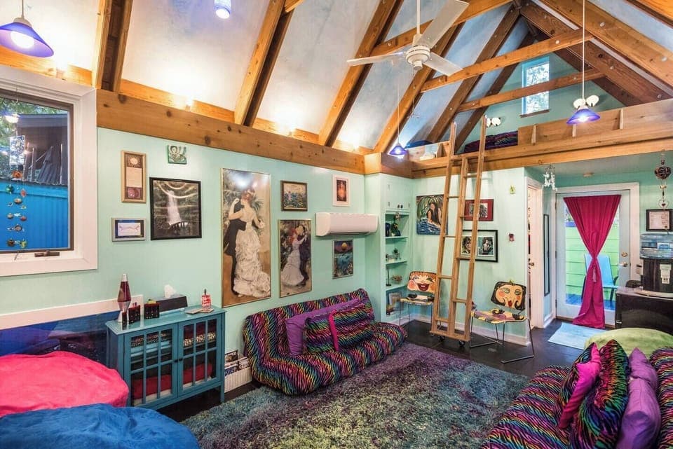 This is the primary sleeping area with an additional futon up in the loft, linens are provided. Lots of blankets, pillows, and sheets. Whatever you might need it is available. 