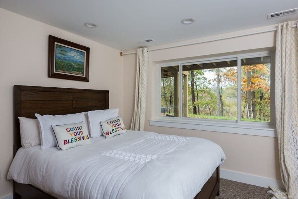 The basement queen bedroom