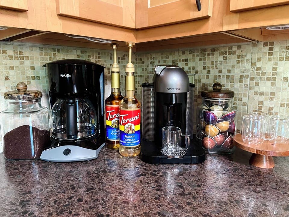 Kitchen - includes cooking utensils, pots, pans, etc. Oh did I mention there is a Nespresso maker with pods provided? And a coffee bar?! 