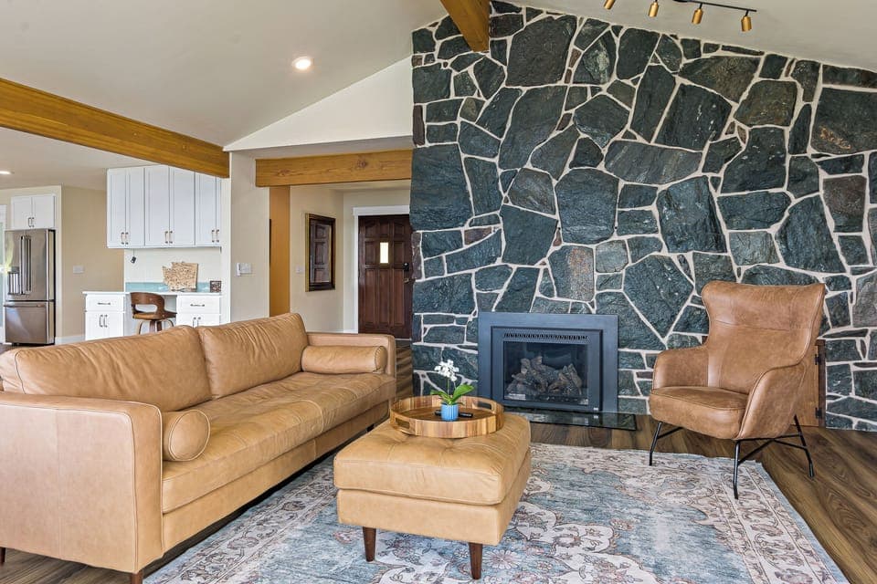 Come get cozy and enjoy the beautiful floor to ceiling gas fireplace. 