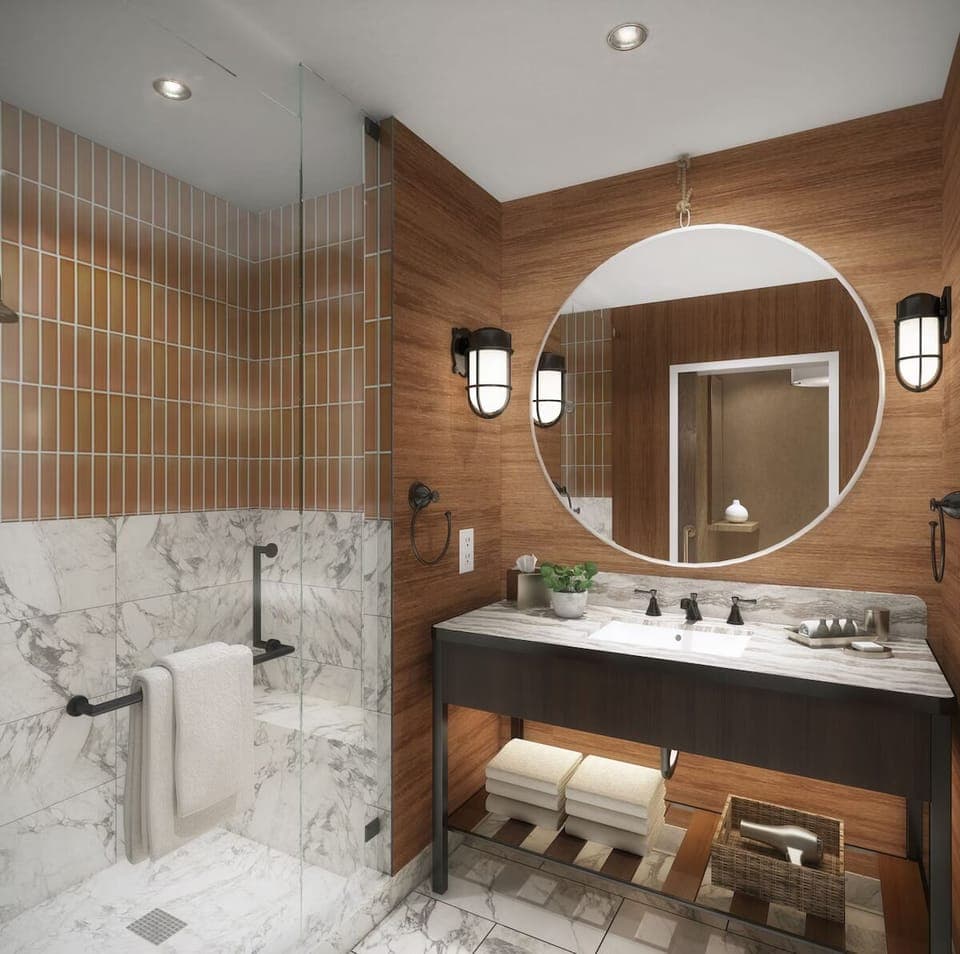 Refresh in a spa-like marble shower with sleek finishes.