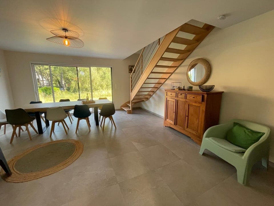 living room with view of terrace and garden 