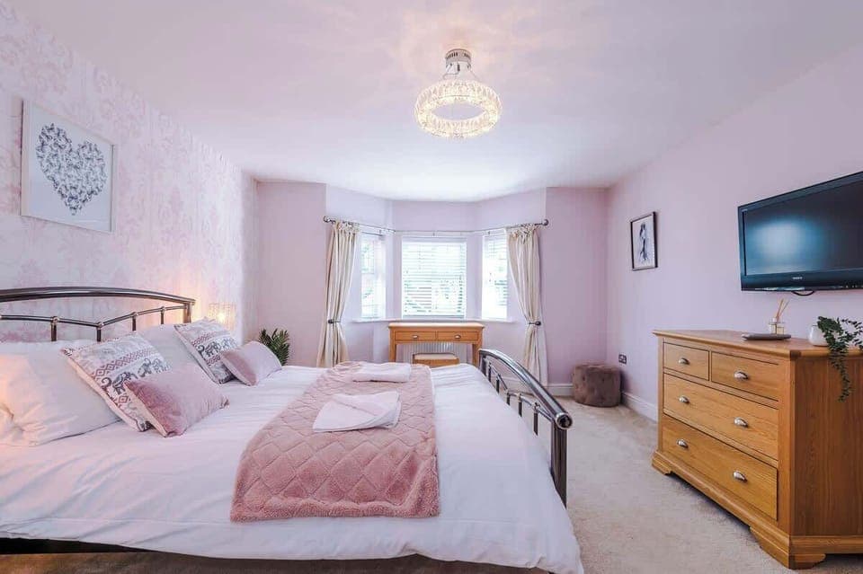 Large King Size bed, makeup desk and your own TV