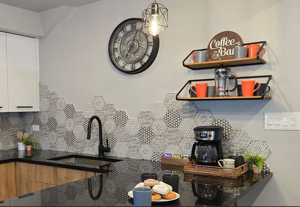 Kickstart your day with a cup of coffee or tea! The cabin has a French press and drip coffee machine, along with complimentary coffee, tea, and sweeteners