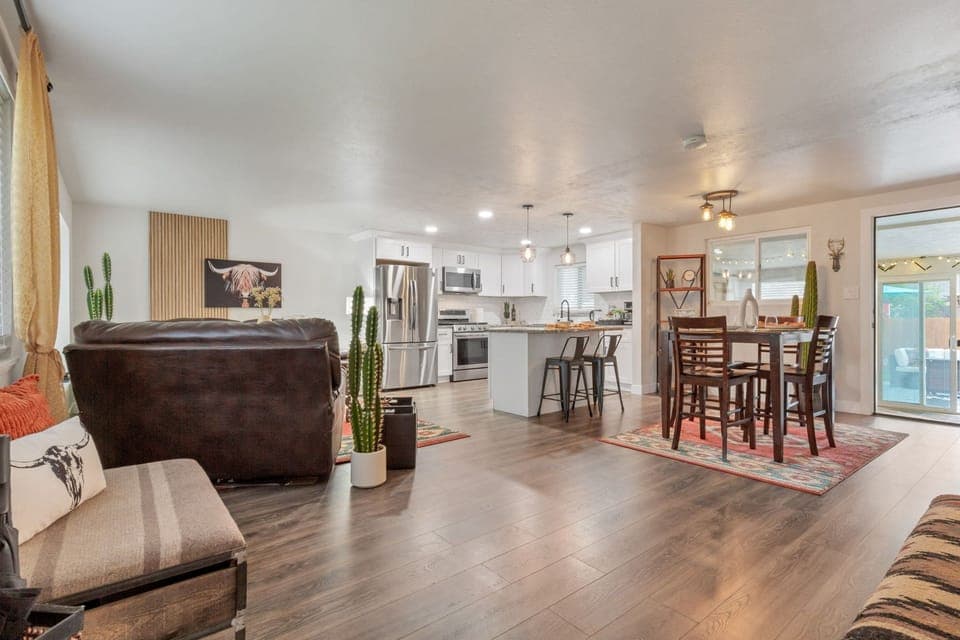 Spacious living room - open floor plan concept with the dining and kitchen
