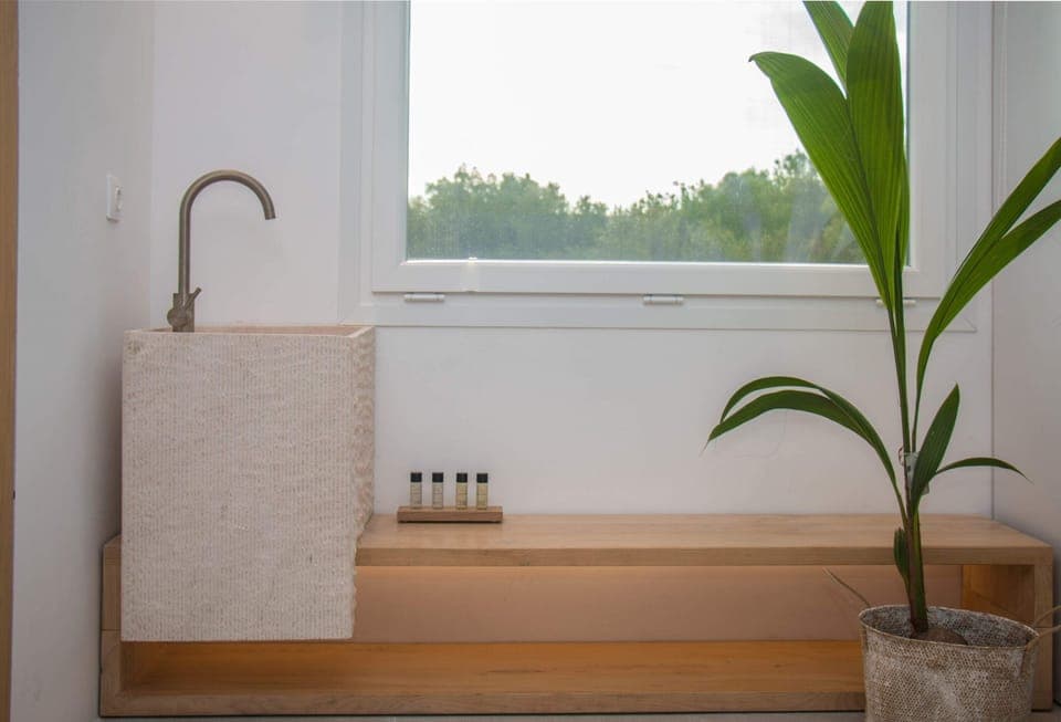 Bathroom 1 – sink and vanity corner
Soft lighting and natural textures around the basin area create a spa-like setting for your daily routine.