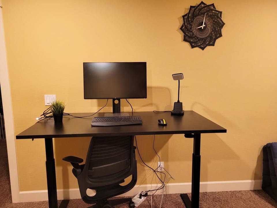 adjustable desk, ergo chair, 4k monitor, and high speed internet 500mbts