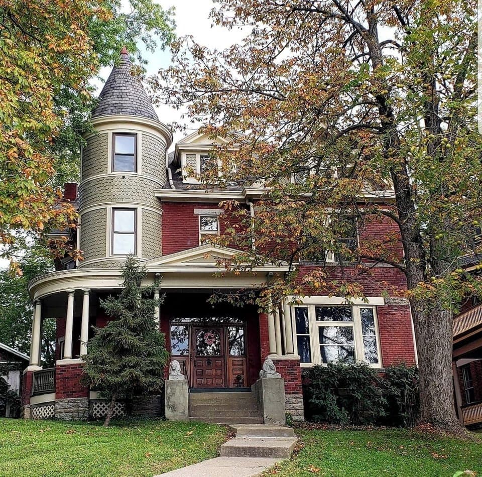 Victorian house up exterior steps. Once inside, common area leads to 3 units