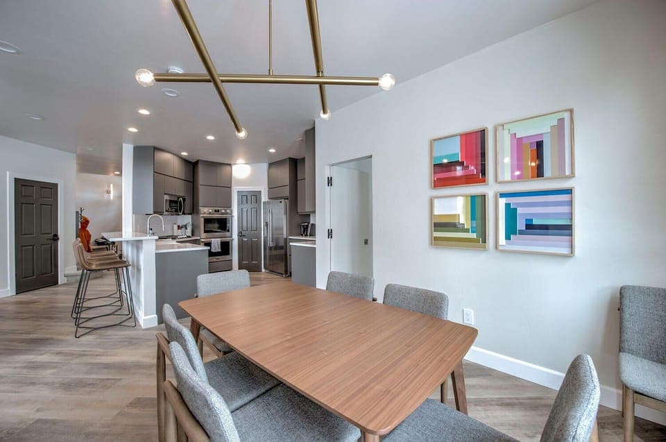 Dining Room with new light fixture and modern touches.