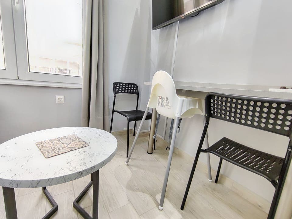 Living area with baby high chair