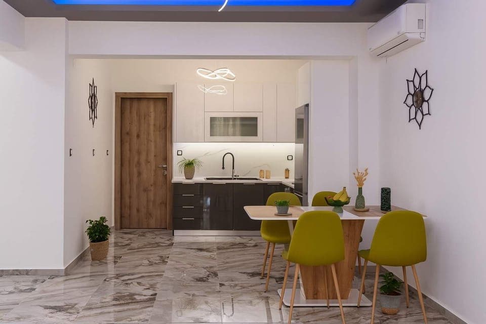 Open-Concept Living and Dining Space
Bright shared space with comfortable seating, modern lighting, and a dining area perfect for meals or work.