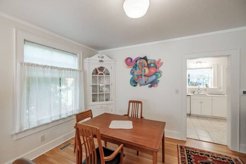 Dine together at a table that seats four and expands to accommodate six.