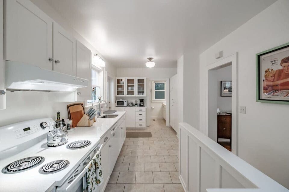 Enjoy a spacious kitchen with great lighting for cooking, dining, and gathering.