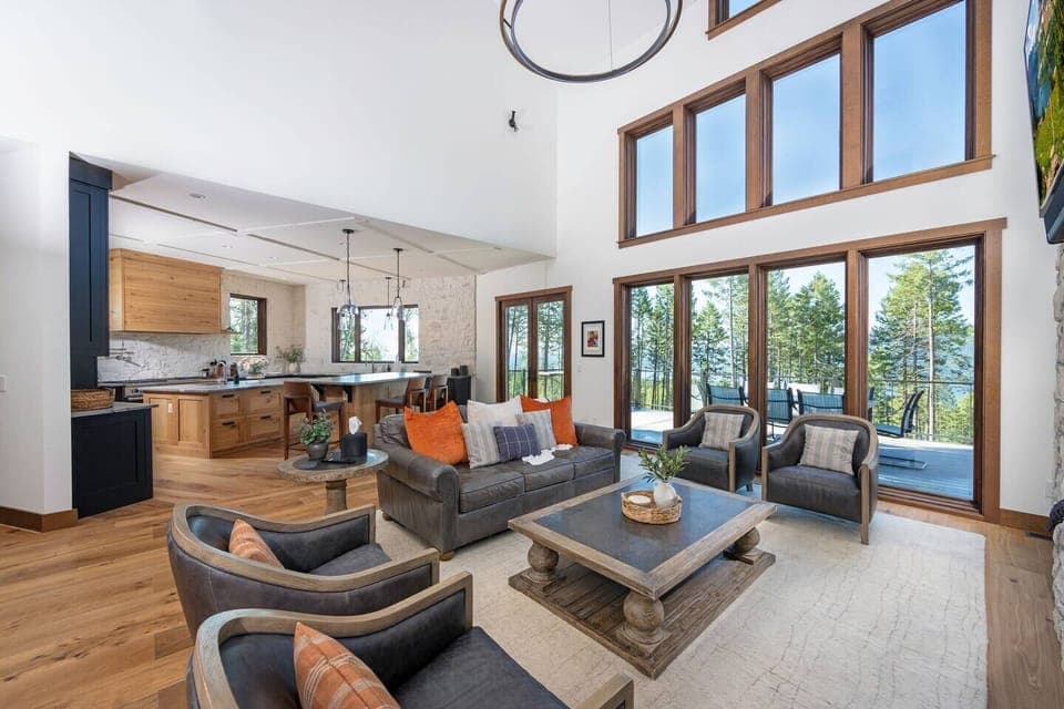 The open concept living space seamlessly integrates the kitchen, living and dining areas.