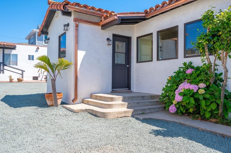 Back patio and garden area accessible through the back door