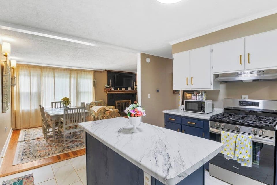Step into this beautifully integrated space, where a modern kitchen flows effortlessly into a comfortable living area, ideal for entertaining and everyday living.