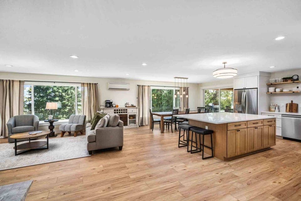 Picture windows throughout the open floorplan offer tons of natural light and vineyard views.