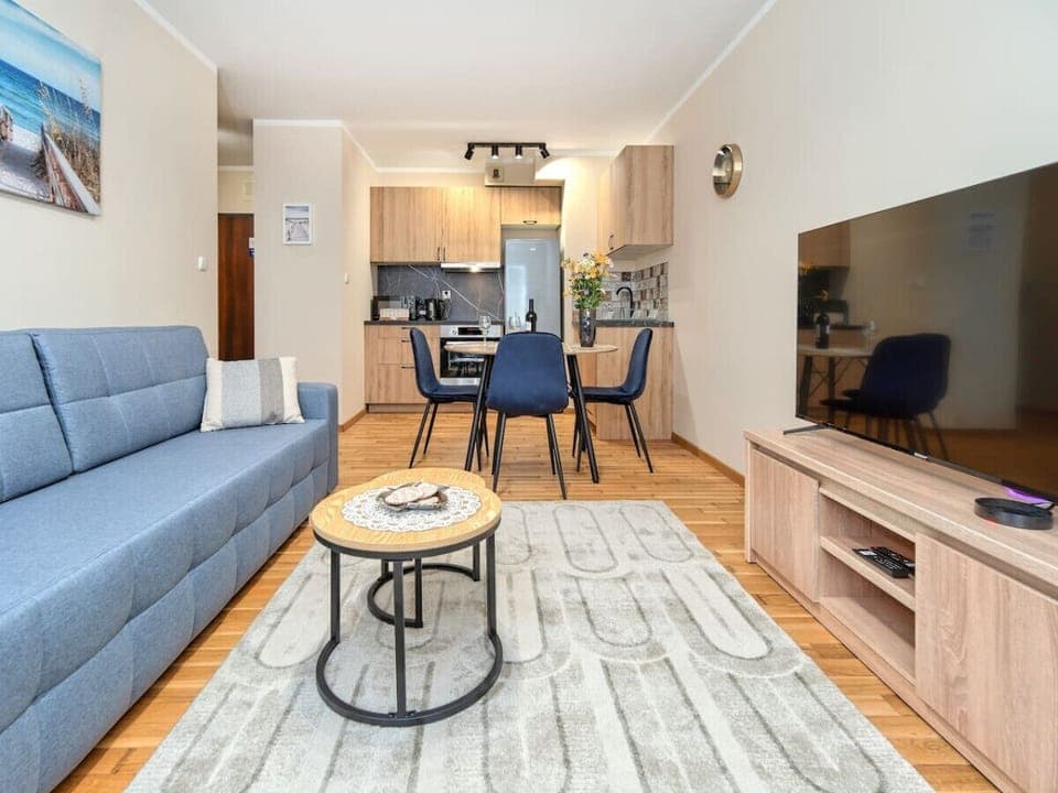 Main Living Area with a Smart TV - Book Now with RENTUJEMY.COM