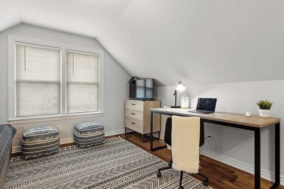 A dedicated workspace in the second floor loft area.