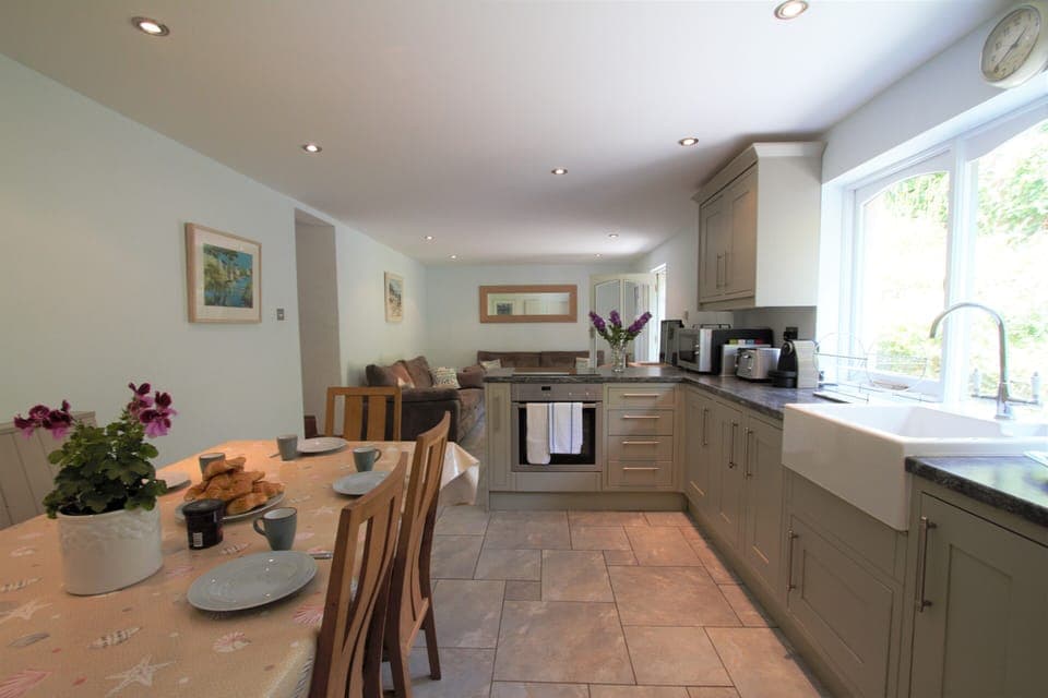 Kitchen with NEFF oven, induction hob and seating for 8