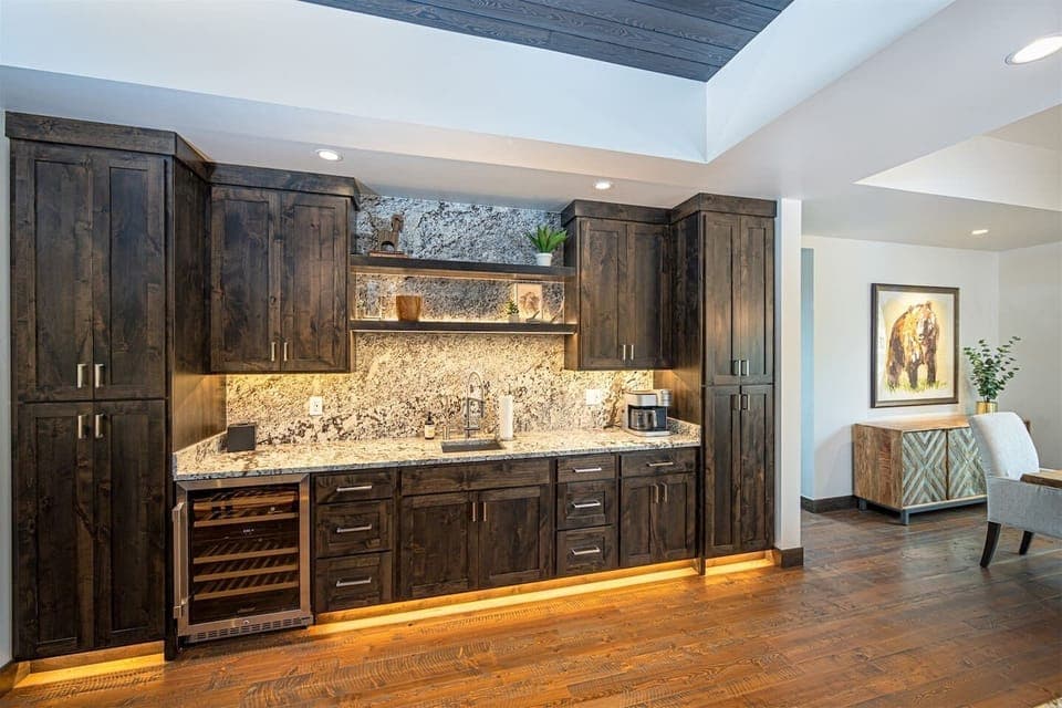 Complete with coffee and wine bar, the fully equipped kitchen has all the comforts of home and then some