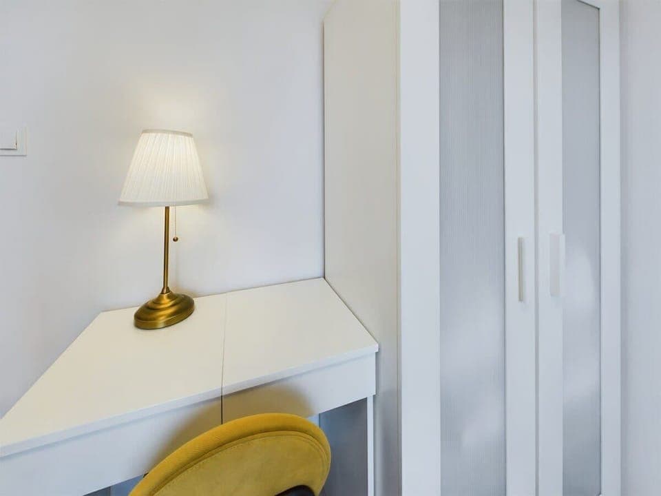 The bedrooms' contemporary decor creates a chic and cozy atmosphere. 