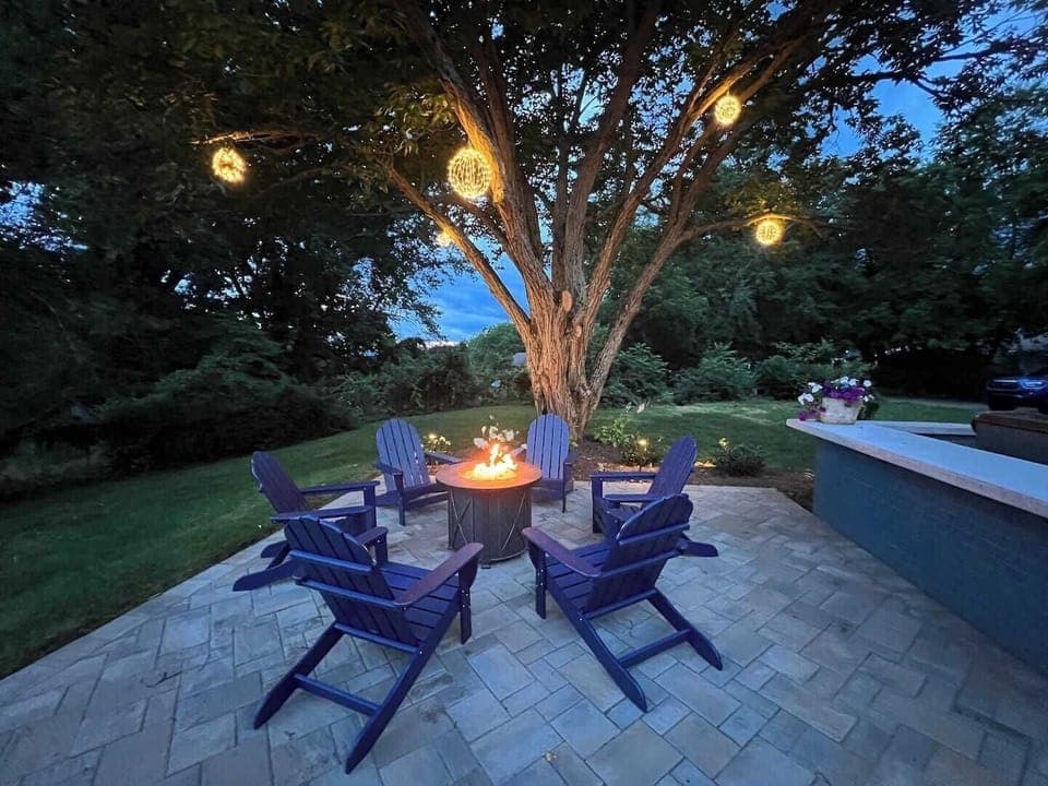 You will want to spend your time on the back patio with a gas fire pit with enough seating for six people.