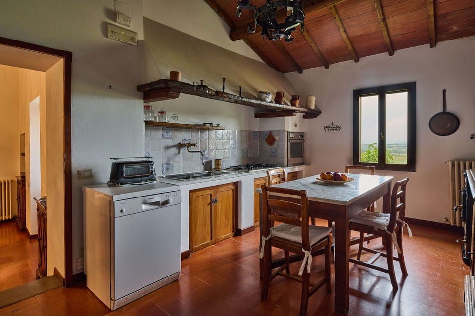 Cabinetry, Furniture, Countertop, Building, Kitchen, Kitchen Appliance, Wood, Table, Kitchen Stove, Lighting