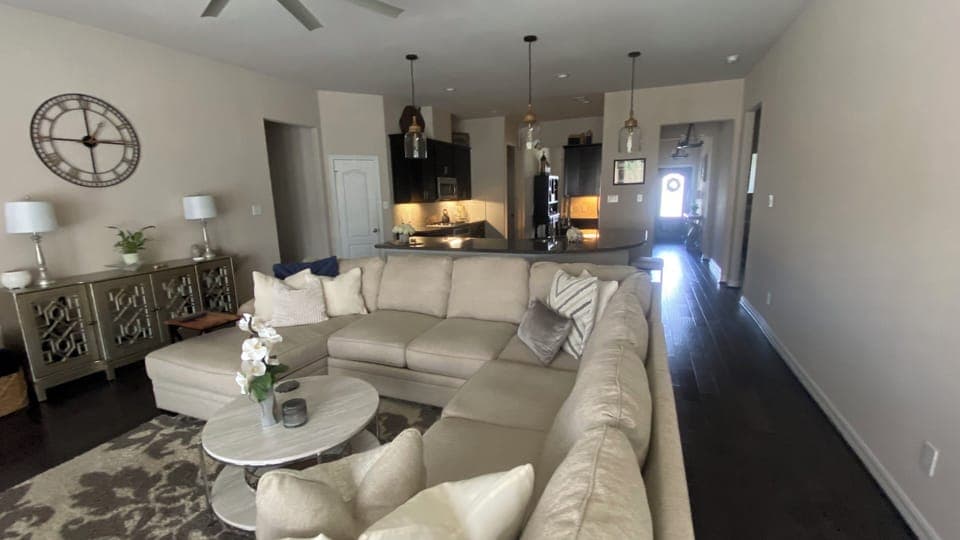Large family room with oversized sectional and chaise