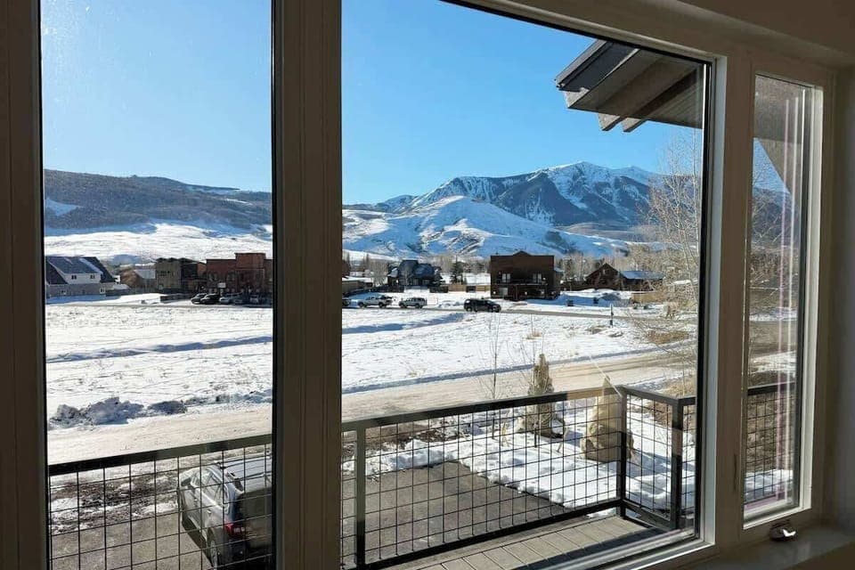Beautiful, unobstructed views of Red Mountain (left) and Whetstone Mountain (right) from the great room and front deck
