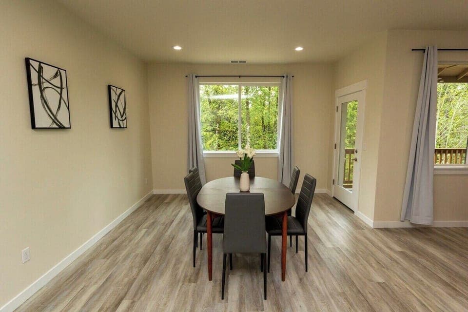 Dining table seats 6 comfortably. There are two extra chairs. 