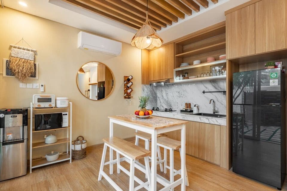 The dining area is adjacent to the kitchen area, making it easy for you to access your meals