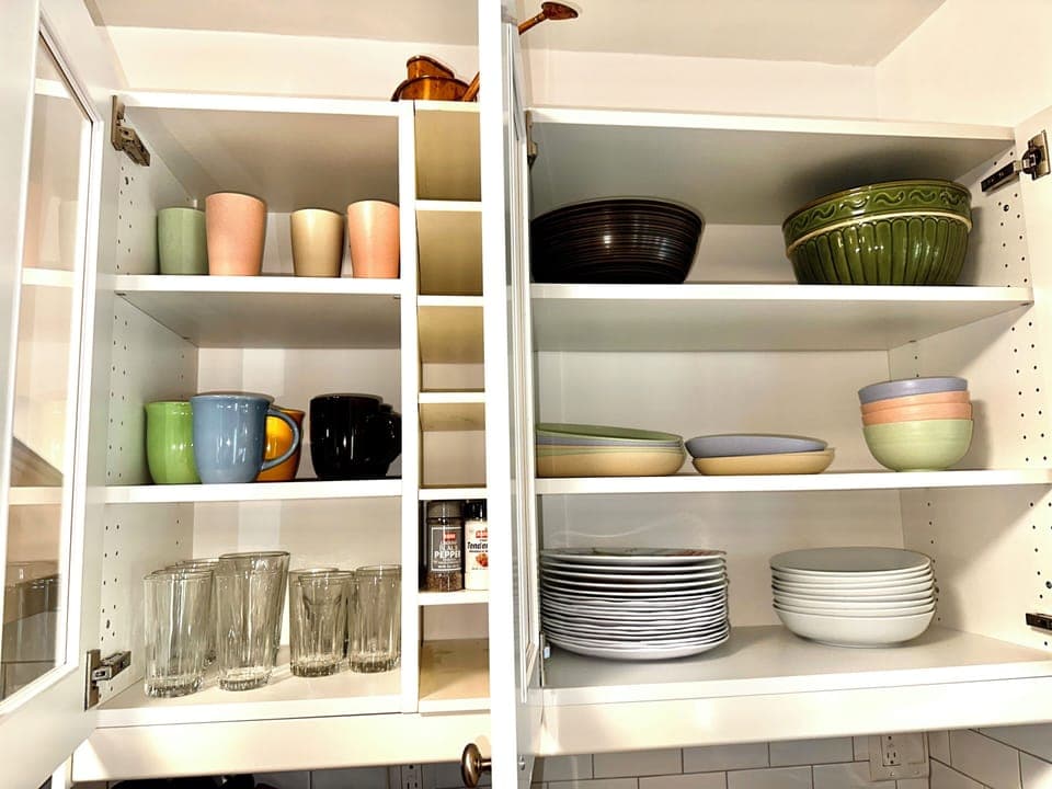 Plenty of dishes and glasses.