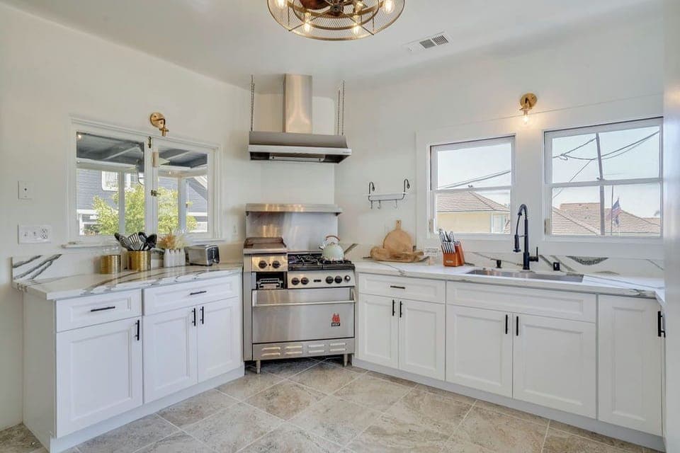 Cook, dine, and entertain with ease in this beautifully designed kitchen. 