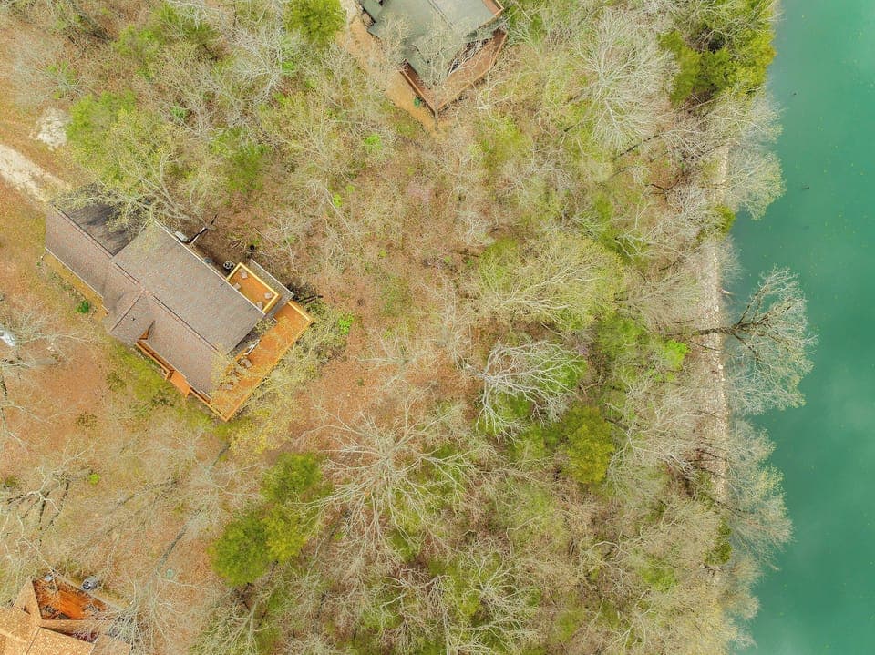 overhead view of home and lake
