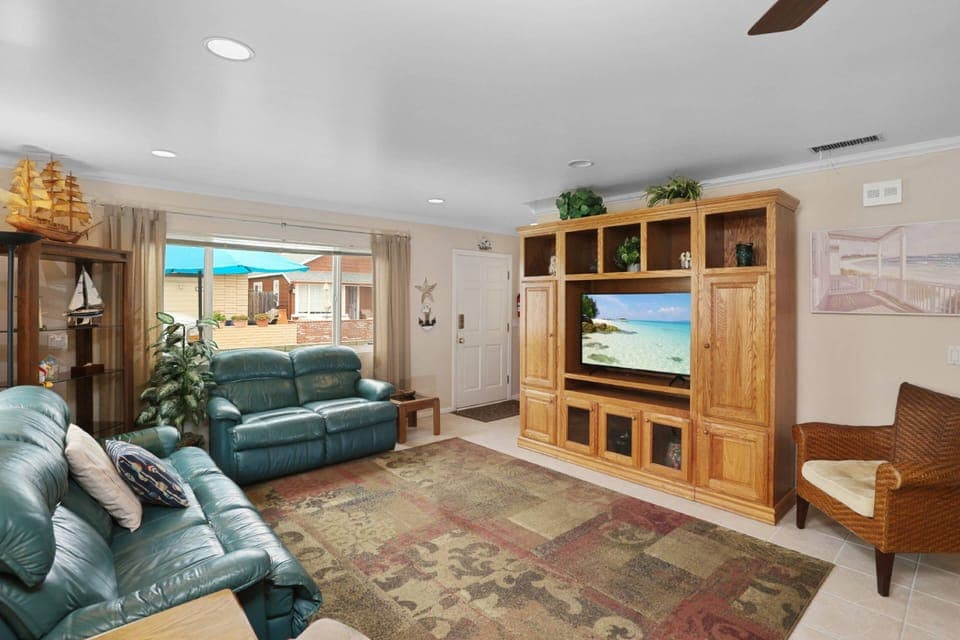 Lots of seating in the living room that provides space to chat, watch TV, plan your day!