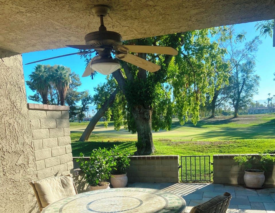 Dining table and chairs on back patio