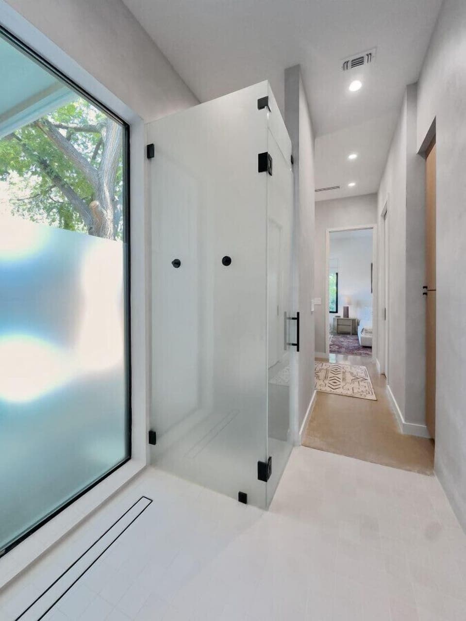 Plenty of light and privacy with enclosed toilet and Toto bidet in the Primary Bathroom