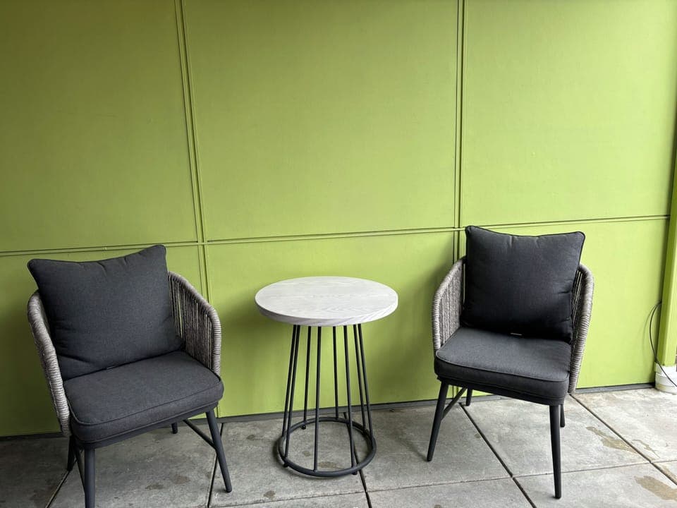 Bistro area on the back porch with built in heater in the ceiling