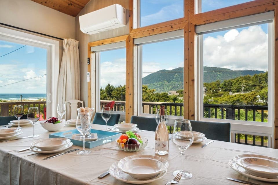 Open living space with newly remodeled kitchen, living room with Smart TV, streaming only, dining room. All with ocean views. Access to deck with outdoor seating and Gas BBQ.