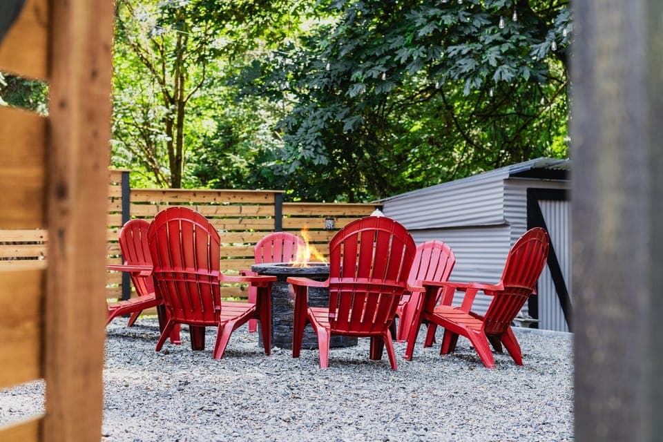- Firepit seating with six Adirondack chairs for relaxation  
- Perfect spot for outdoor evenings and friendly conversation  
- Enjoy peaceful mornings or nights around the warm fire  
