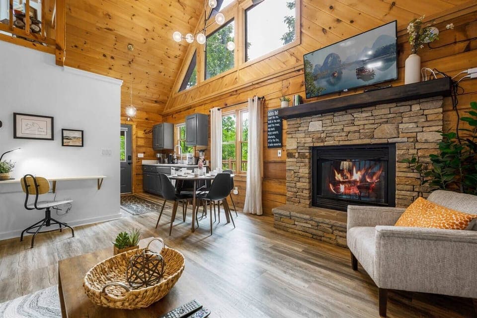 Open space living rooms - Comfy seating, fireplace, HDTV TV with Roku, dedicated workspace. 