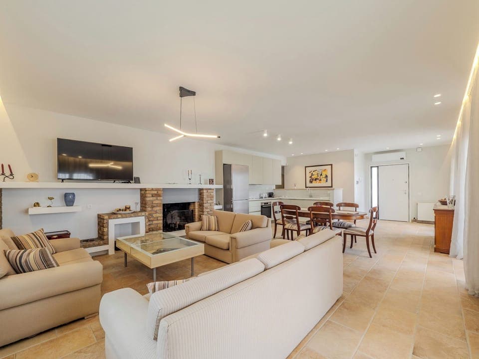 "Indulge in the ultimate relaxation experience as you sink into our plush sofas, surrounded by chic decor and artistic flair."