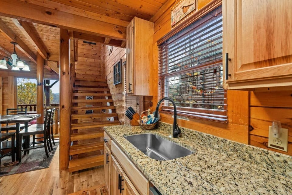 Enter the cabin through the fully-equipped kitchen. It includes everything that the chef in your group will need to make meals inside.