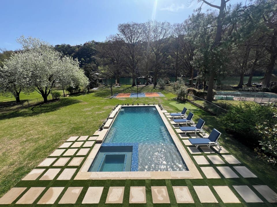 Stunning pool w/jacuzzi, pickleball court, outstanding Lake Austin view/access.