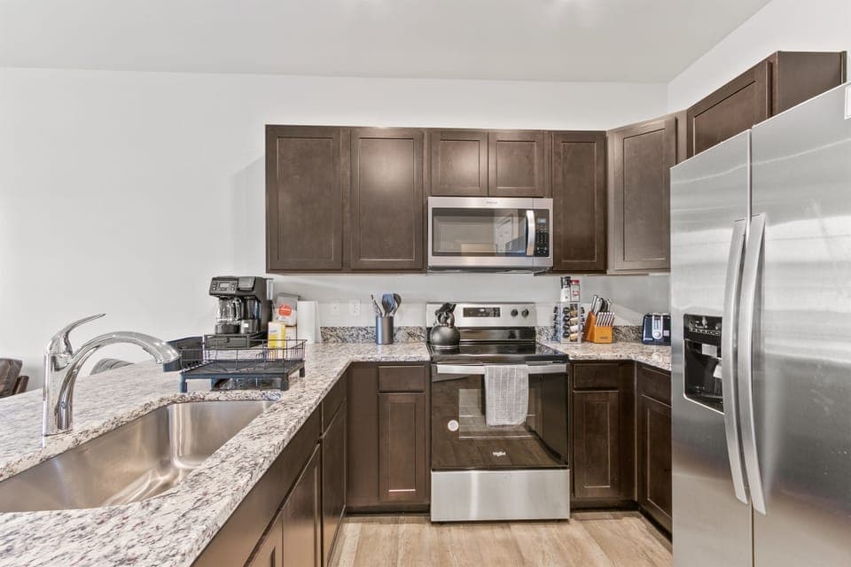 Modern Kitchen: Cook up delicious meals with sleek appliances and ample counter space!